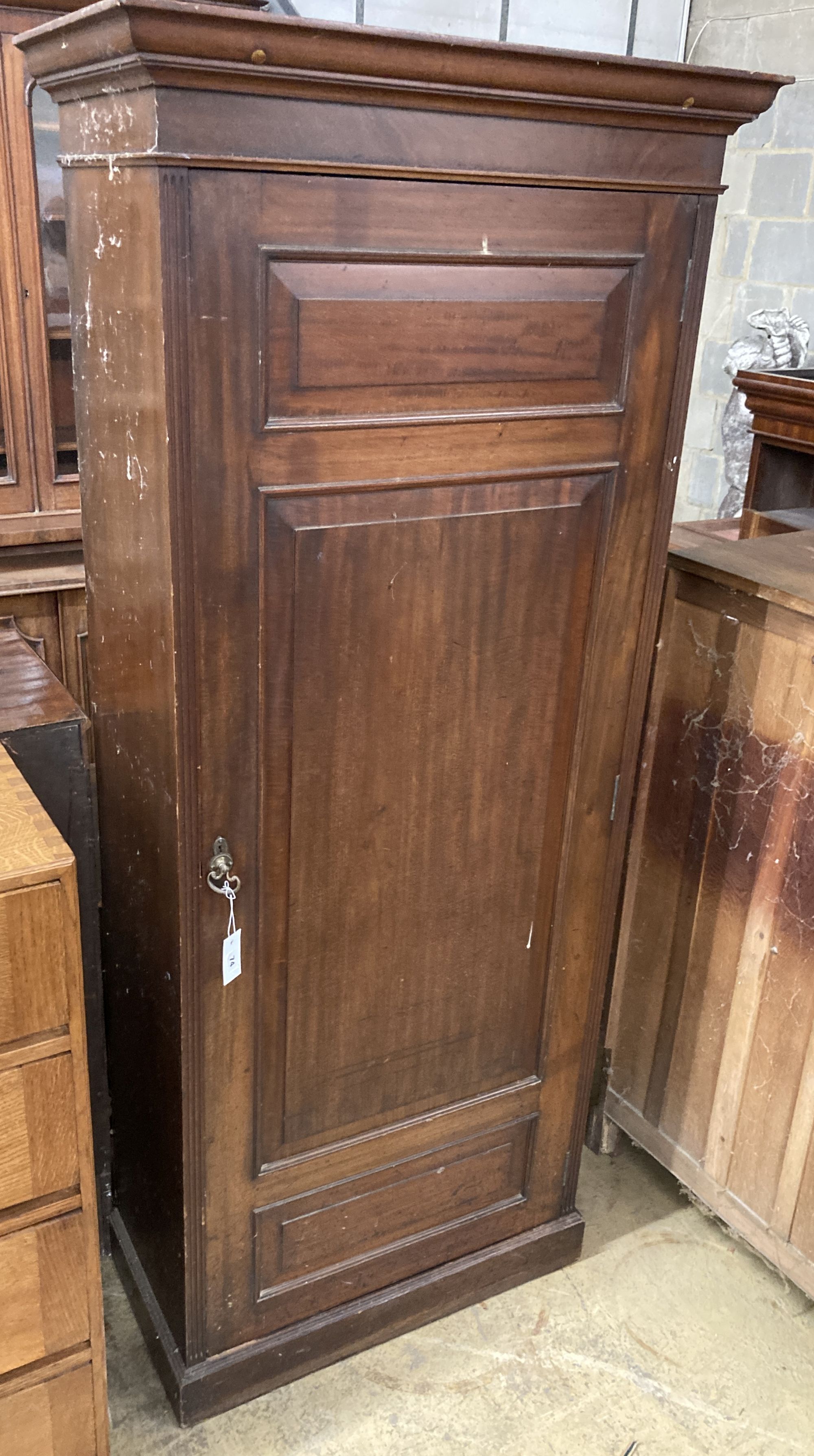 A Victorian walnut single door wardrobe, of narrow proportions, width 85cm, depth 42cm, height 196cm